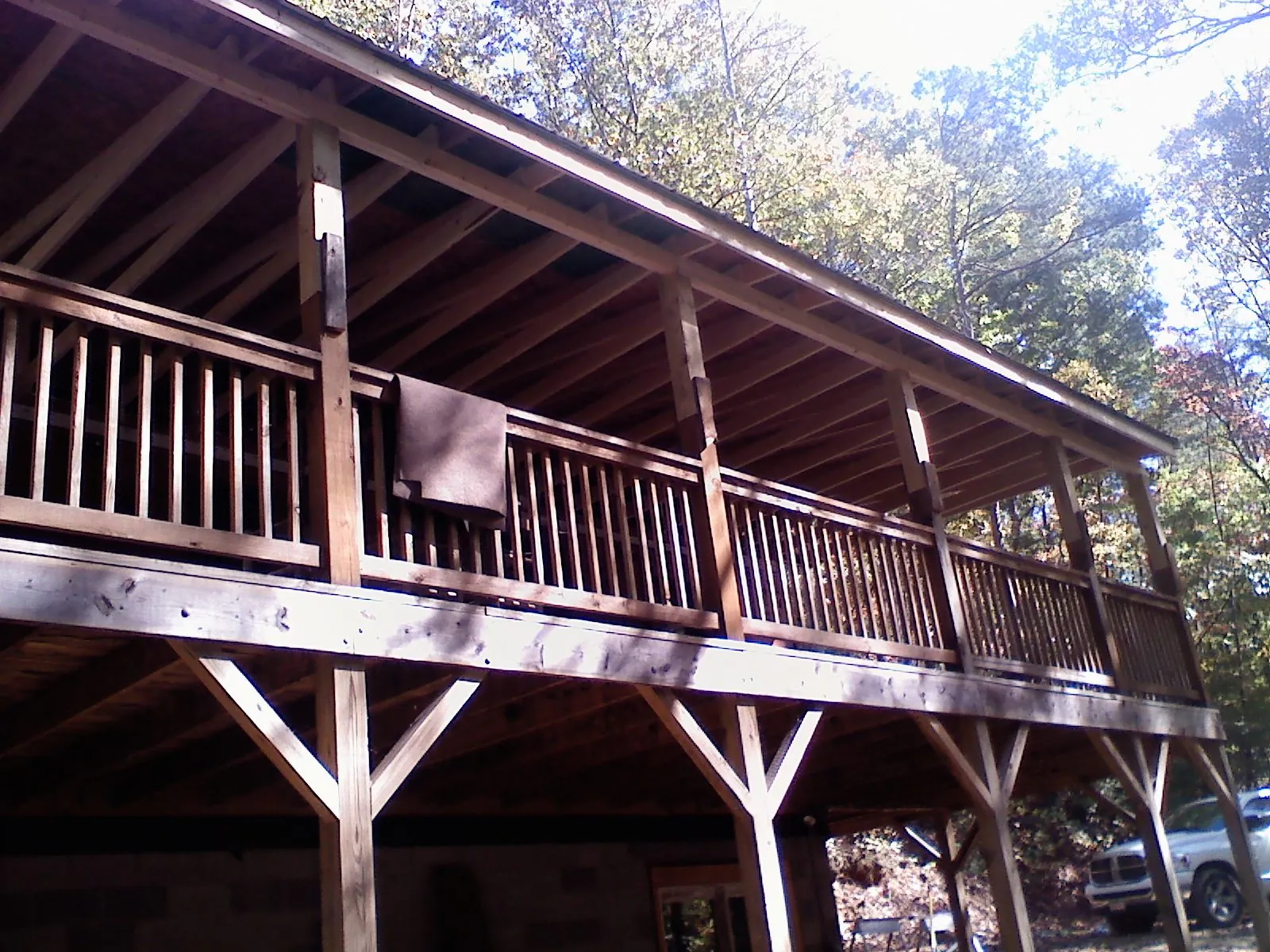 Timber framing under a new elevated porch and deck — Roof Leak Repair in Sherman Oaks by Roofing Brothers